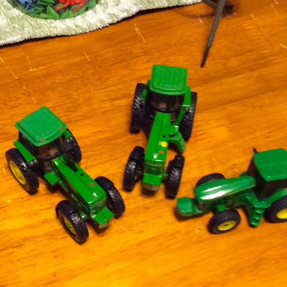 3 John Deere Ertl toy tractors.  4960 4430 9750